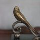 Vintage bookends, brass bird on black marble base, brass animals