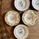 Set of 6 mismatched antique deep plates.