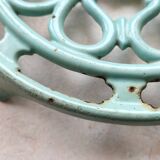Water green enamelled trivet.