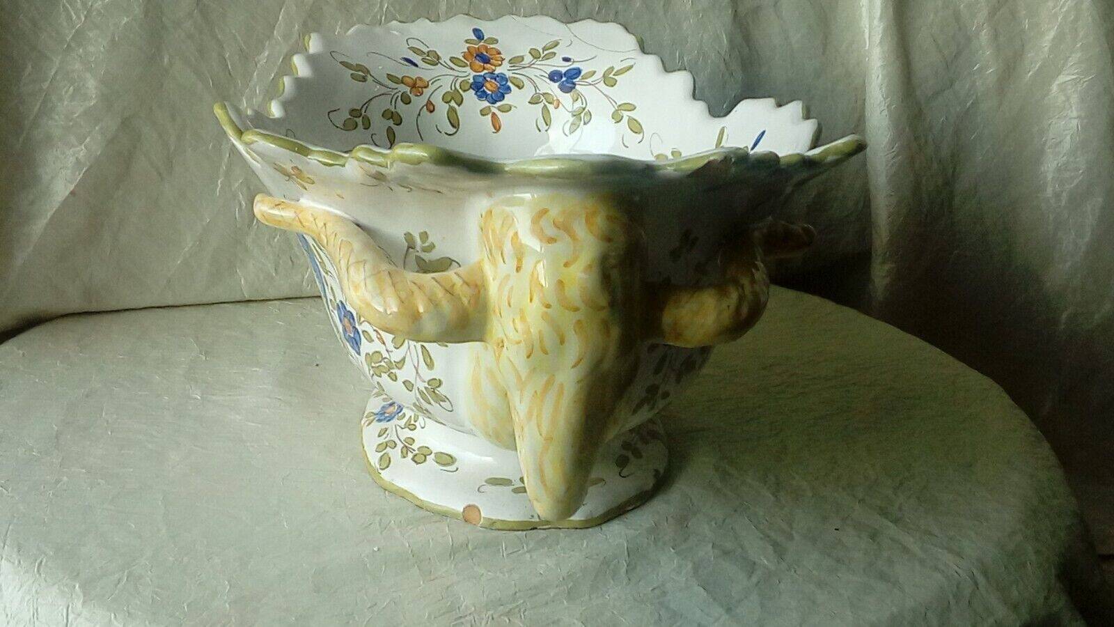 Moustiers earthenware planter with ram's head