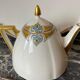 Teapot in porcelain of Limoges "forget-me-nots" old