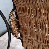 Small antique piece of furniture from the 1960s made of rattan and wrought iron in the shape of a lyre.