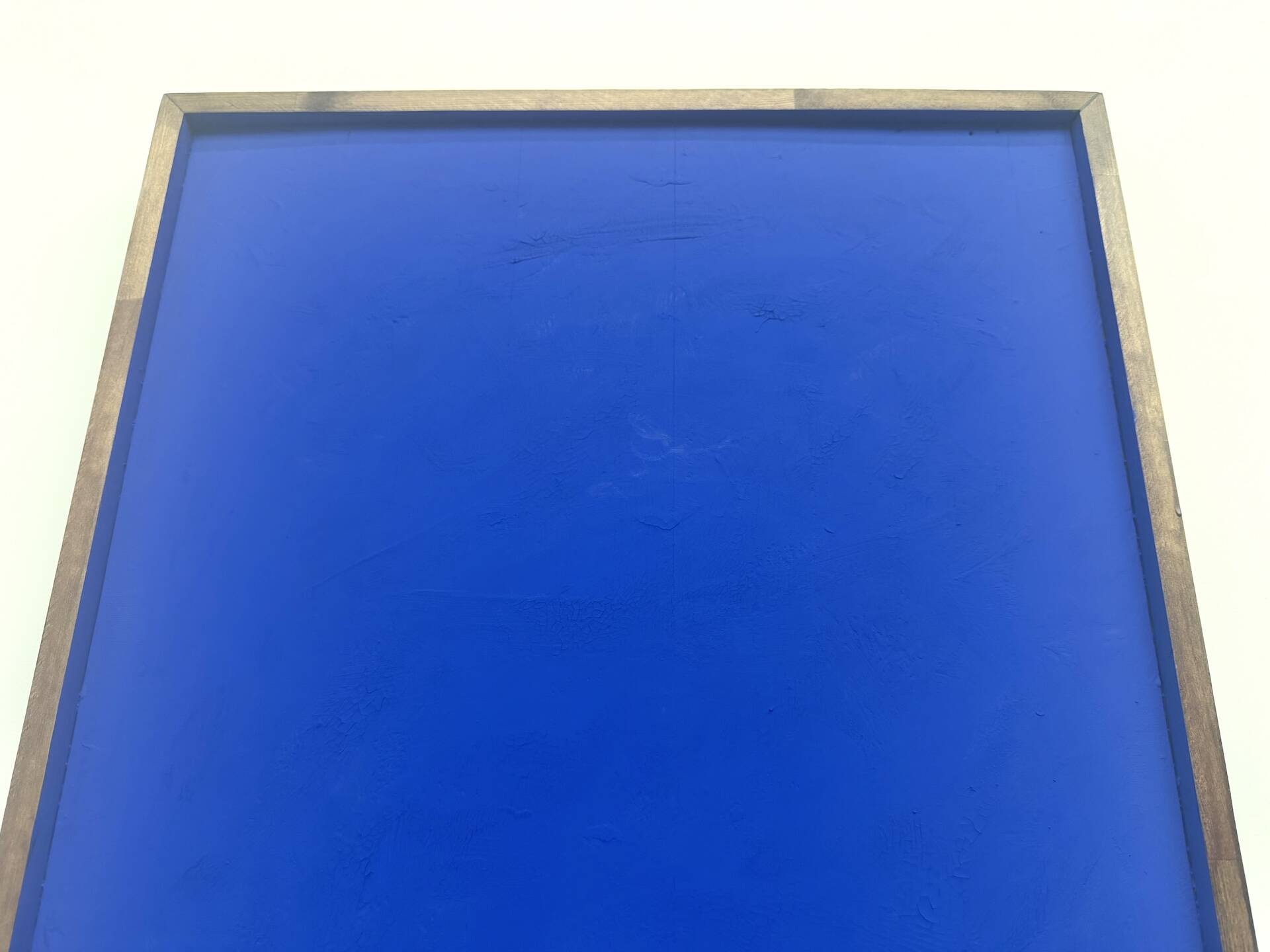 Monochrome table in ultramarine blue, acrylic on solid wood.
