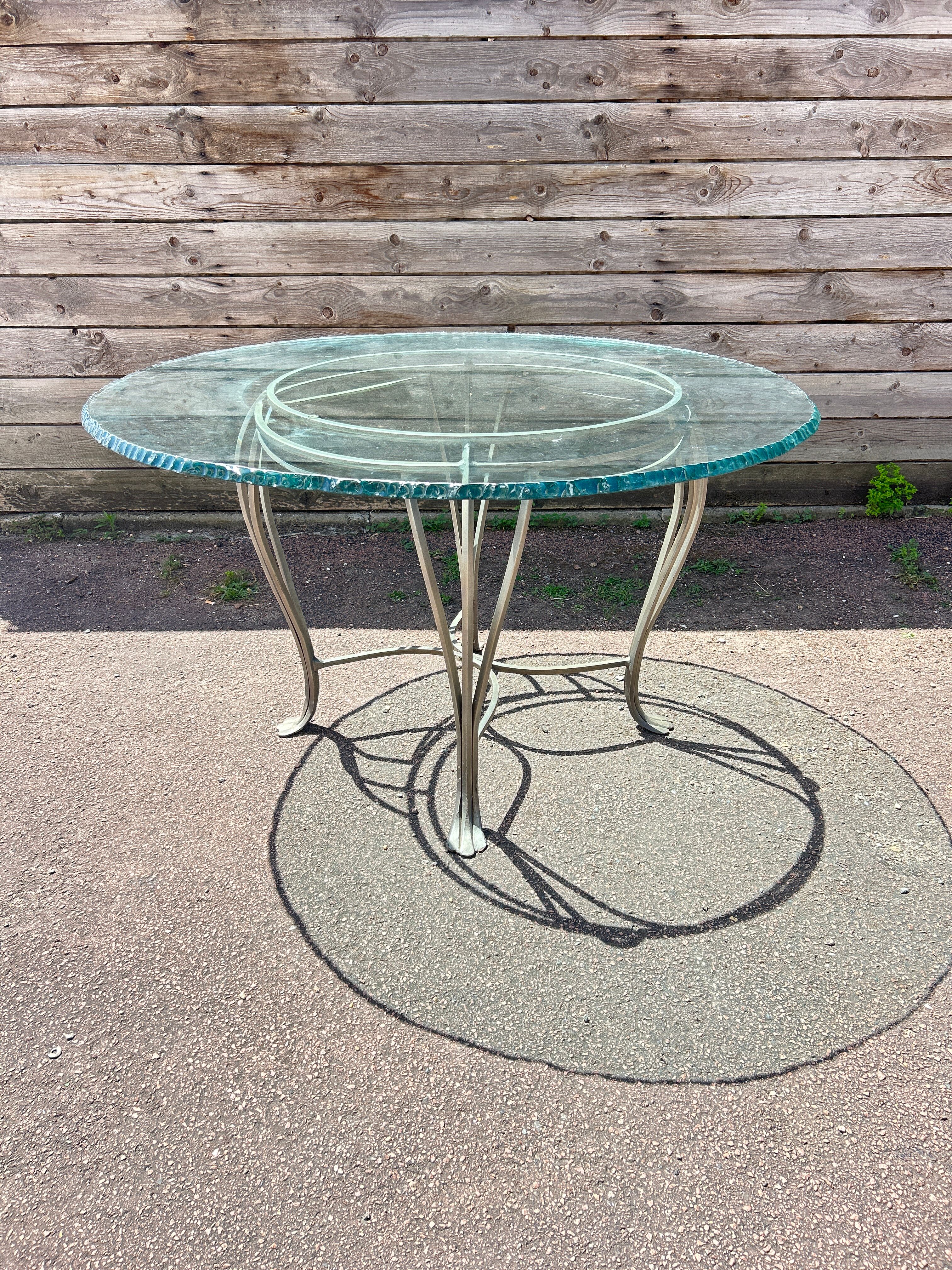Table ronde en verre et fer forgé
