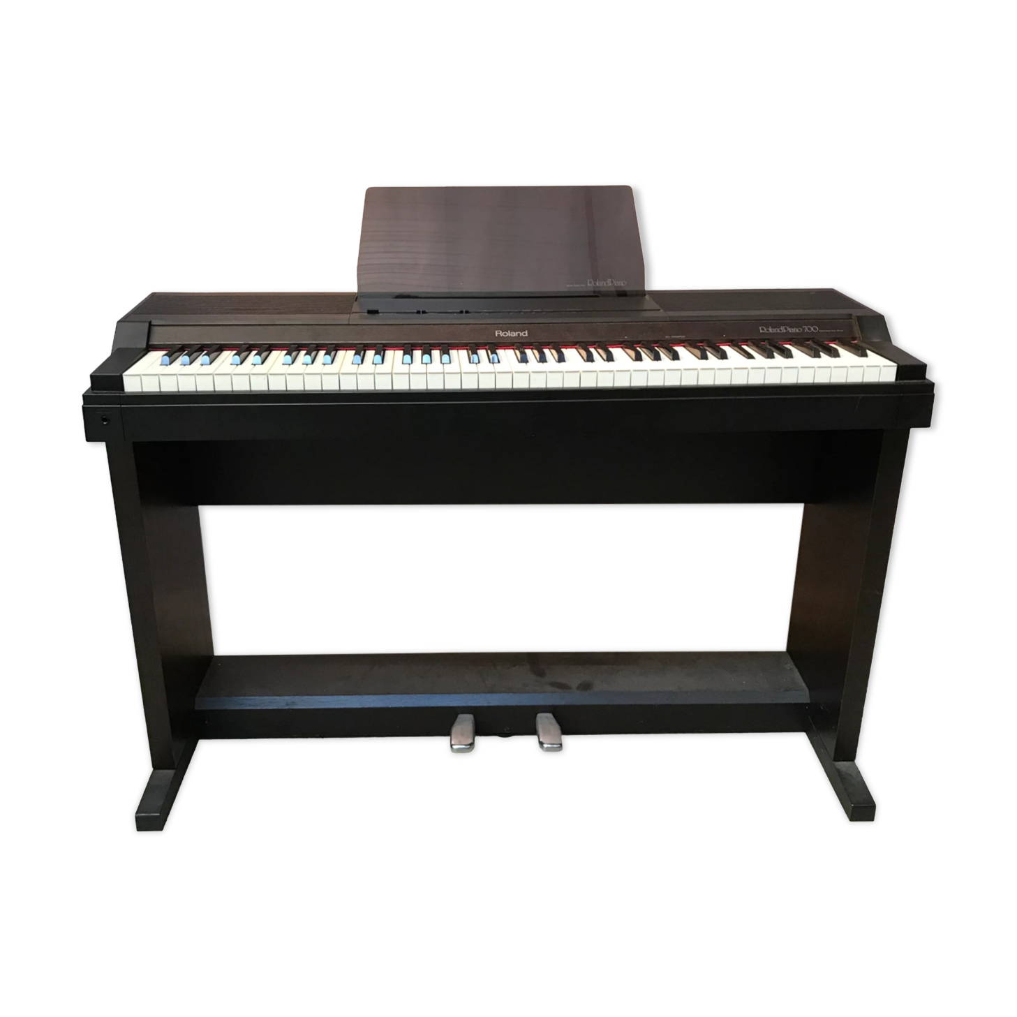 Roland HP 700 keyboard and its stand with pedal