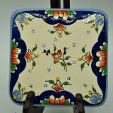 Under the plate and bottle signed Rouen collection art of the table