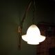 Early 20th century art deco wall lamp with brass bracket and opaline glass shade