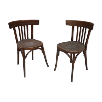 Paire de chaises bistrot anciennes avec patine foncée