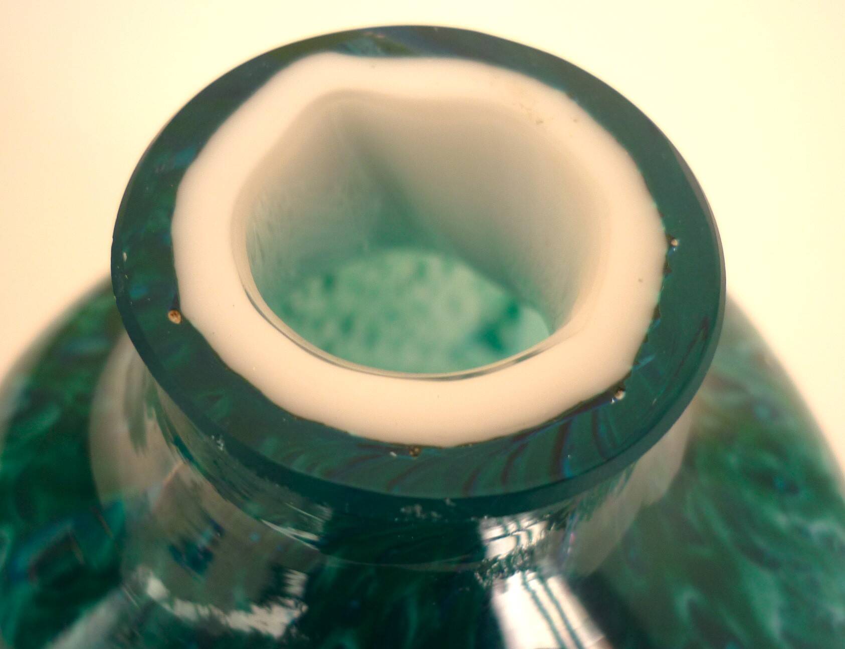 White multi-layer blown glass bottle vase with blue and green inclusions