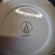 Set of 6 vintage dessert plates from L'Amandinoise in good condition.