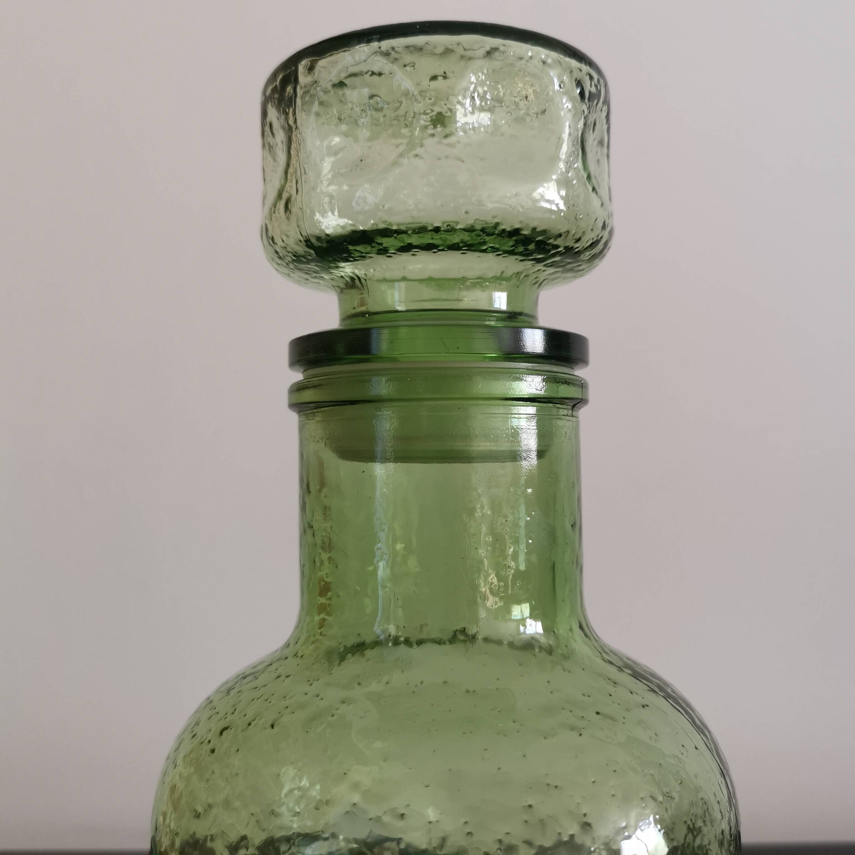Old green glass carafe