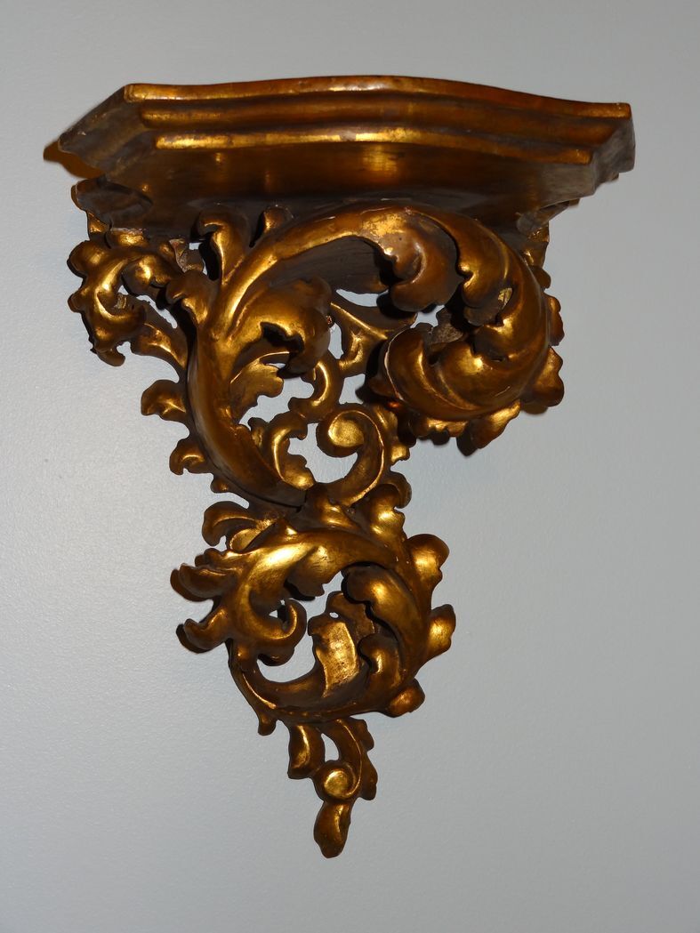 19th century wall console in gilded carved wood