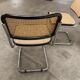 Pair of black Breuer b32 chairs and cannage