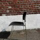 Set of 6 black metal chairs, model GF 40/4 by David Rowland.