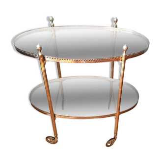 Brass and glass trolley on wheels