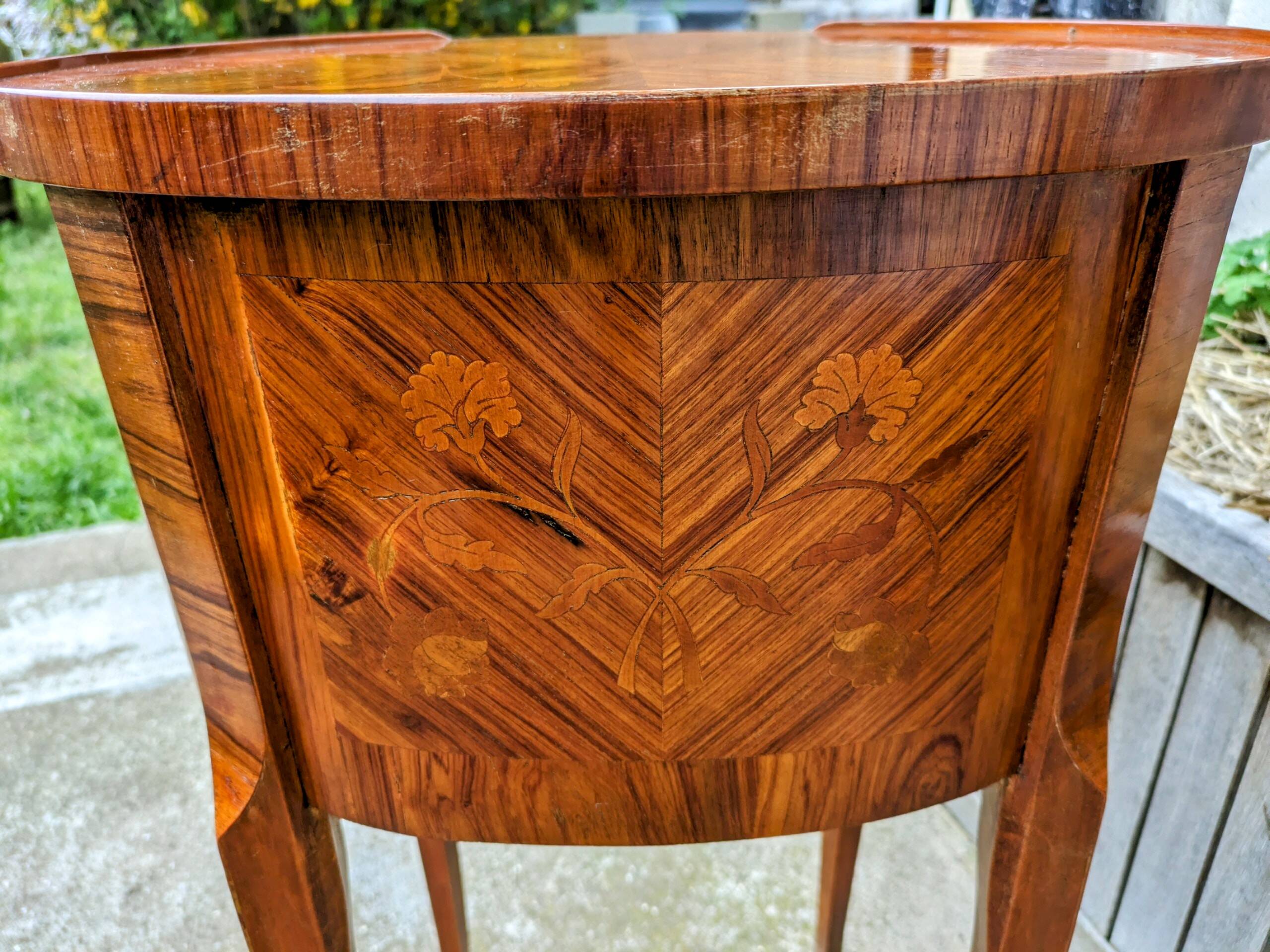 Old oval bedside table in rosewood marquetry Louis XV style