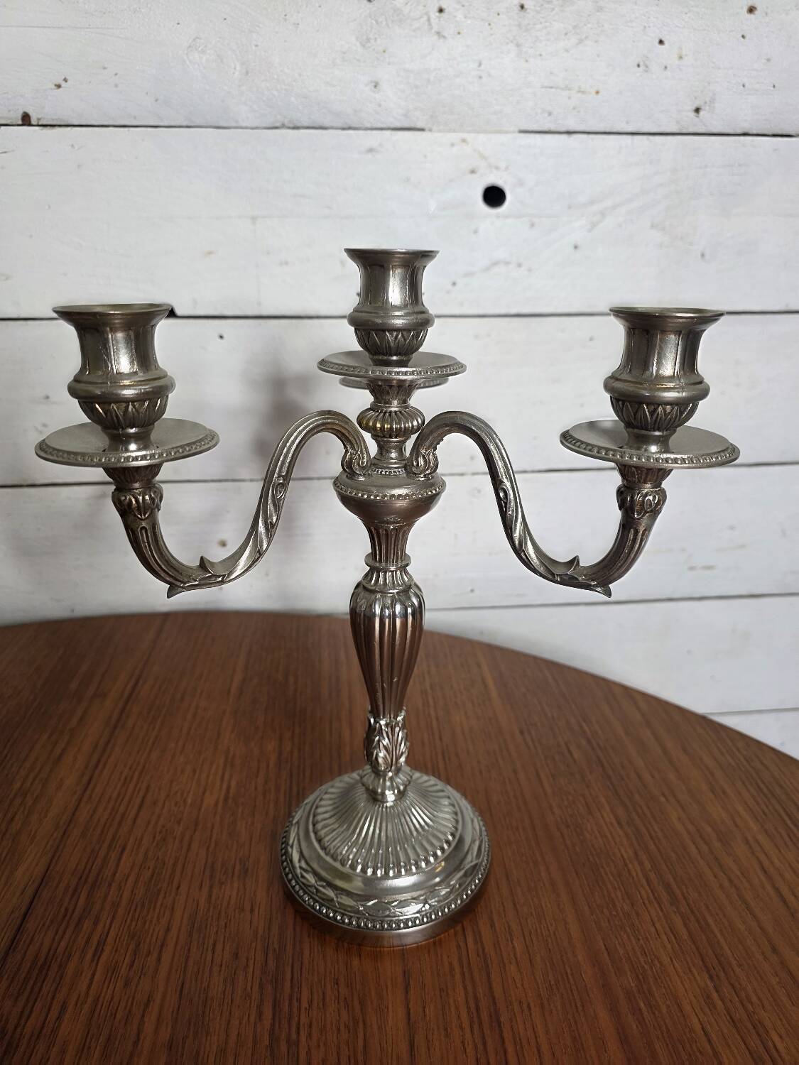 Pair of Louis XVI style candlesticks in silver-plated bronze