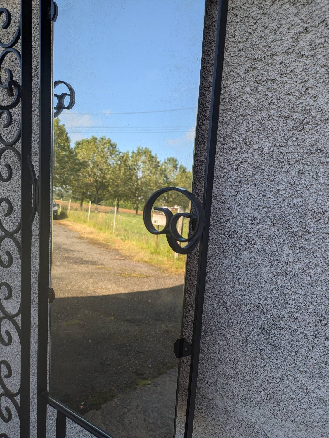 Wrought iron coat rack