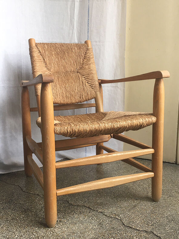 "Paillé" armchair by Charlotte Perriand