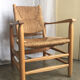 "Paillé" armchair by Charlotte Perriand