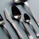 GUY DEGRENNE STAINLESS STEEL CUTLERY SET, 1970s