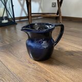 Navy blue stoneware pitcher