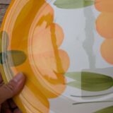 Round serving dish with hand-painted yellow flowers in ceramic TC Italy.