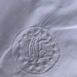 Large pillowcase, white cotton, lined with lace and monogrammed, closed with mother-of-pearl buttons