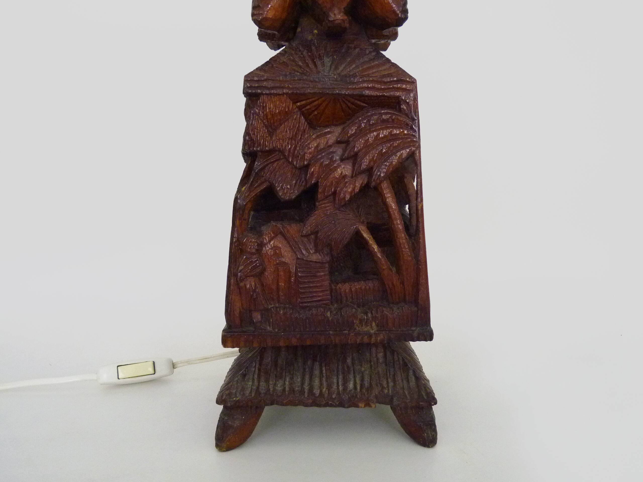 Old large lamp from Malagasy School and Tananarive in carved wood. Art Deco.