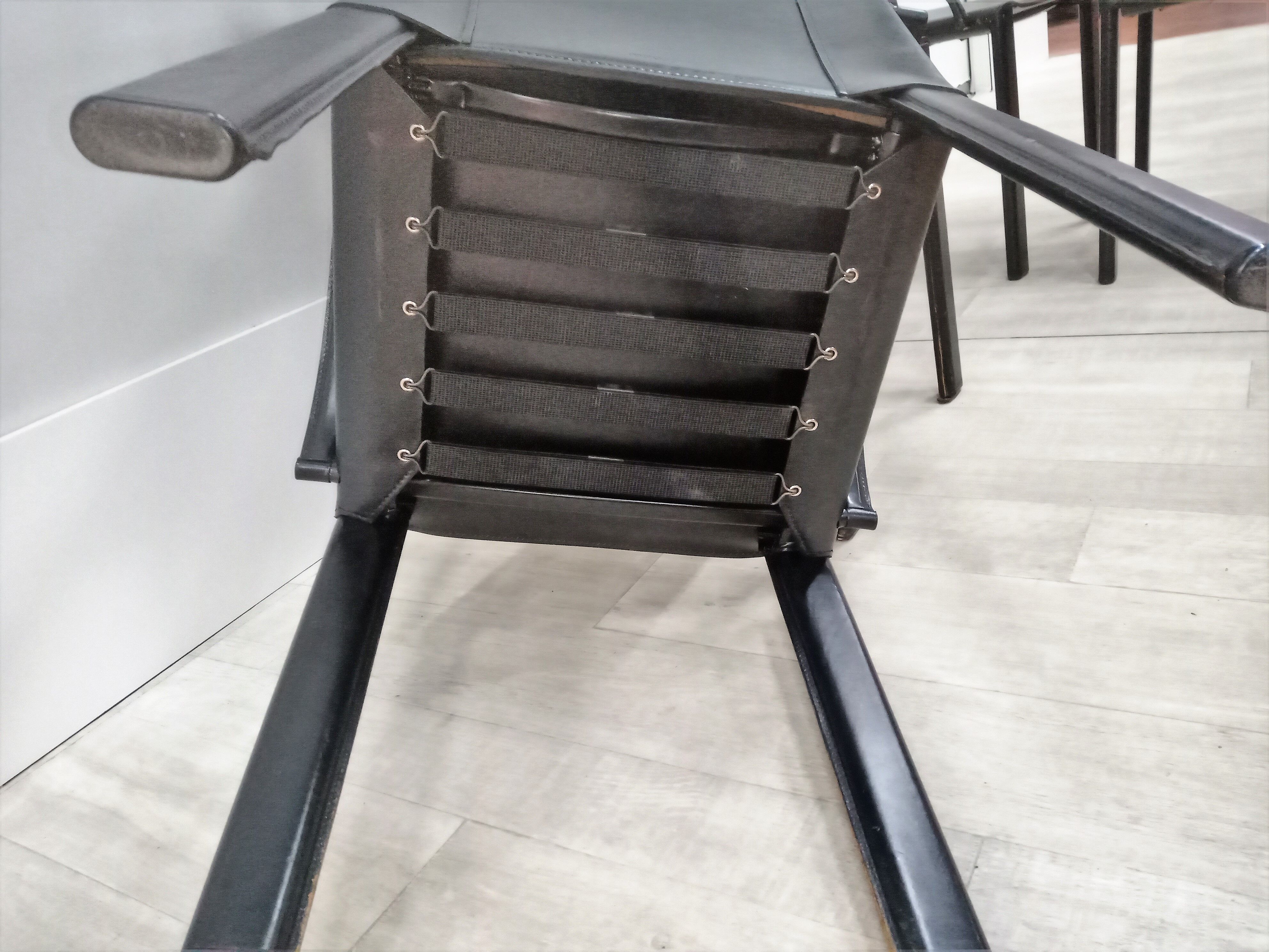 Black leather coral chairs by Matteo Grassi