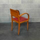 Small red bridge chair with armrests