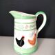 Andrea West rooster pitcher for Sigma
