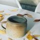 Pot cover with vintage sandstone handle