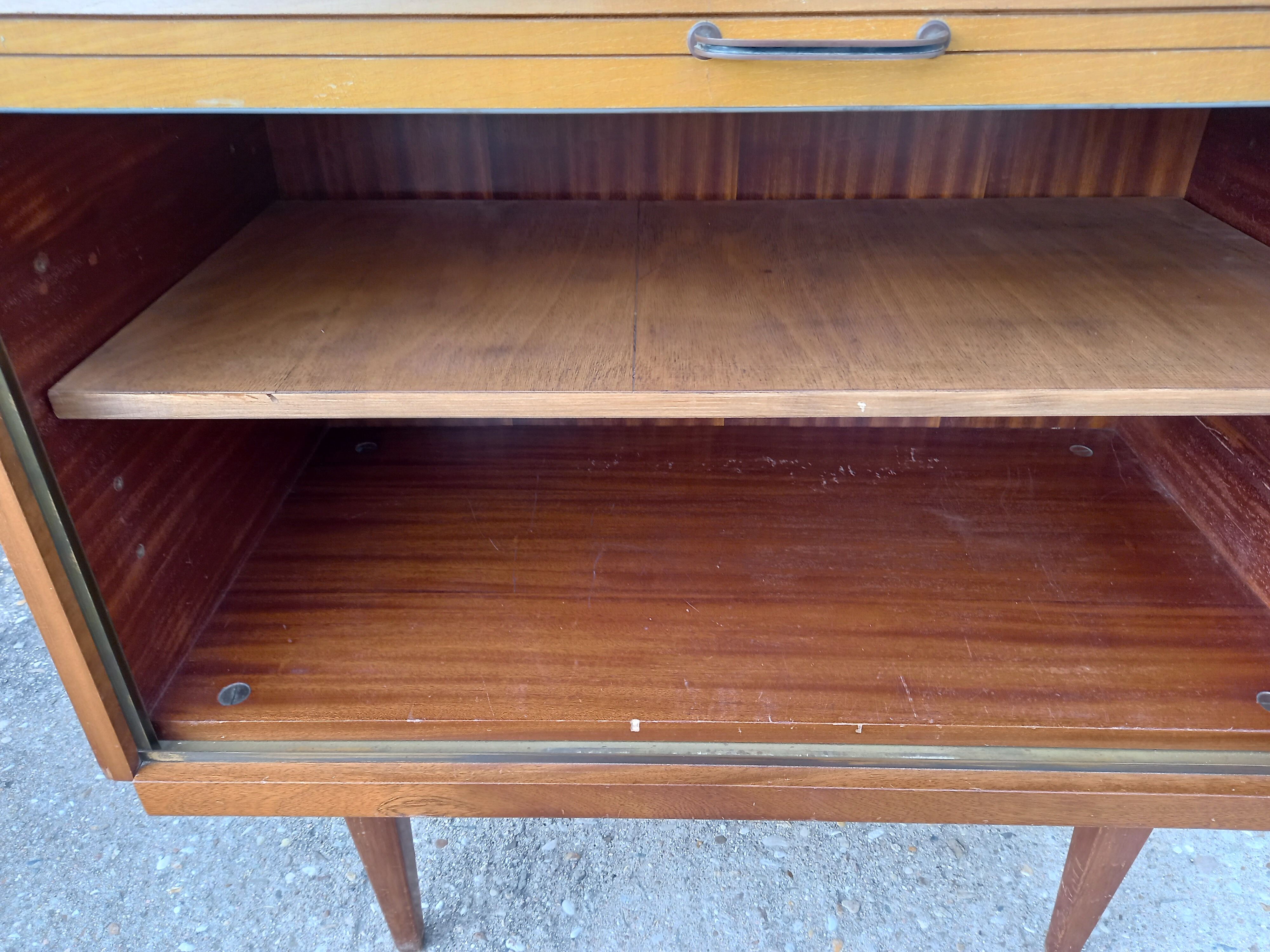 Vintage sideboard with shutter or sliding door 60s