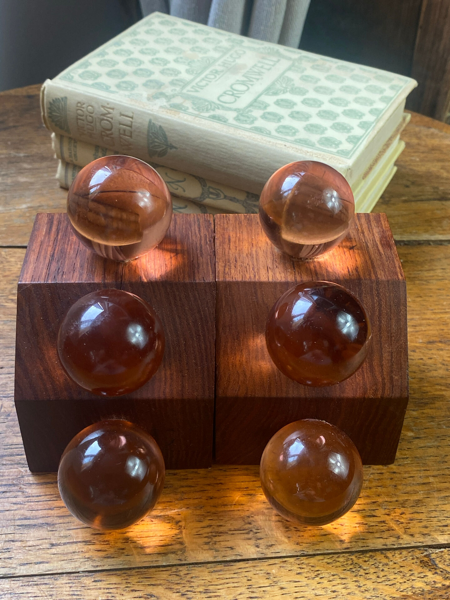 Wooden bookends and spherical glass balls