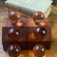 Wooden bookends and spherical glass balls