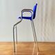 Vintage high chair for children in chrome metal and blue plastic