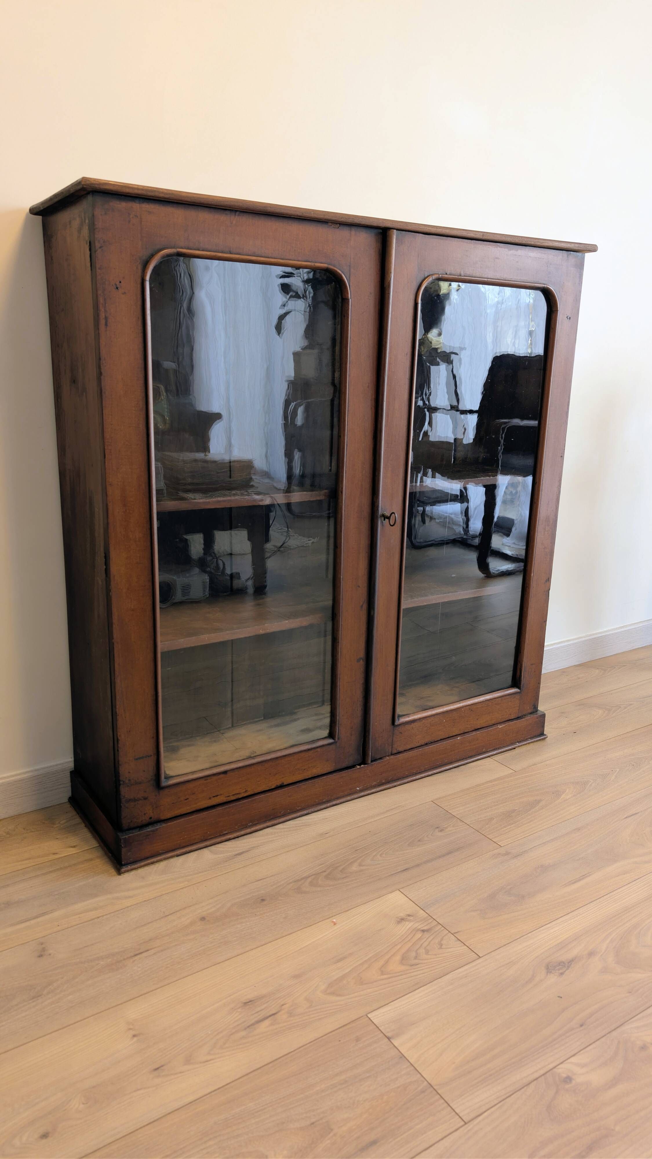Victorian English mahogany display cabinet, elegant showcase furniture.