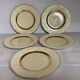 Five small floral plates England