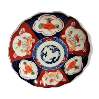 Antique plate in polychrome porcelain IMARI, Japan, red, orange and blue floral decoration.