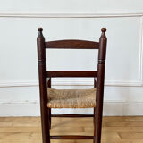 Wooden chair and children's straw
