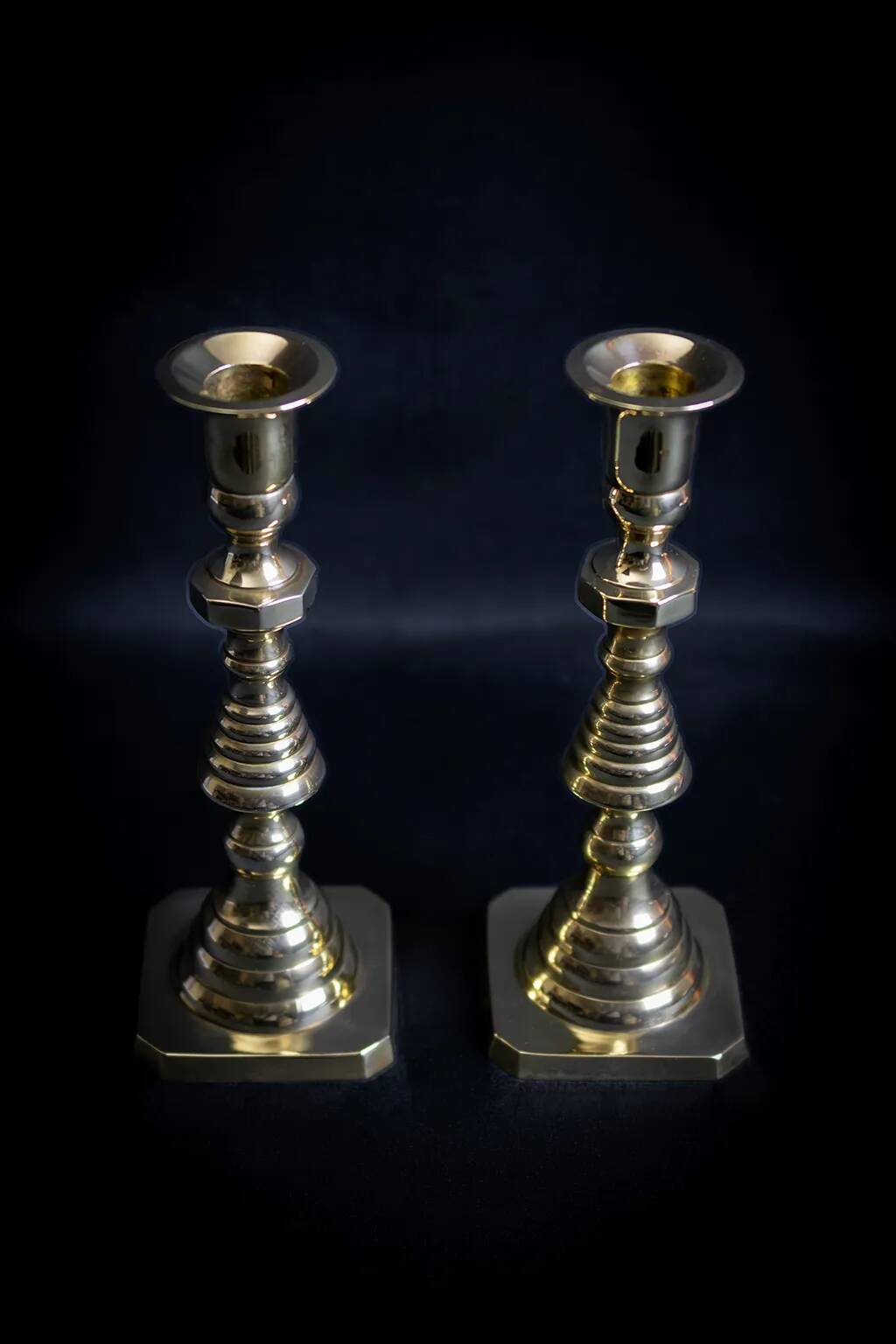 Pair of Victorian copper and brass candlesticks