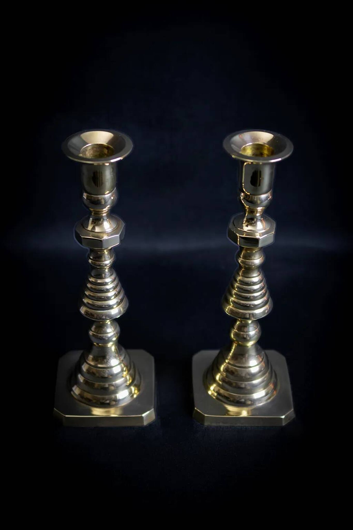 Pair of Victorian copper and brass candlesticks