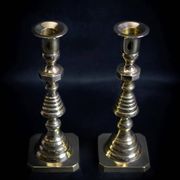Pair of Victorian copper and brass candlesticks