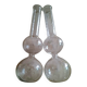 Single-stem vases made of flasks