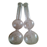 Single-stem vases made of flasks