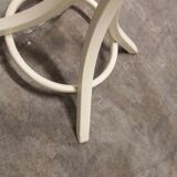 Parrot wears white Baumann coat 1970