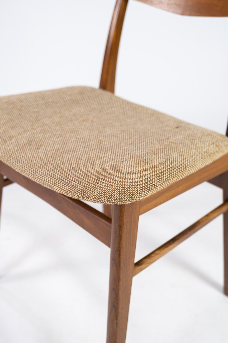 Dining room chair in teak and light fabric of danish design from the 1960s.