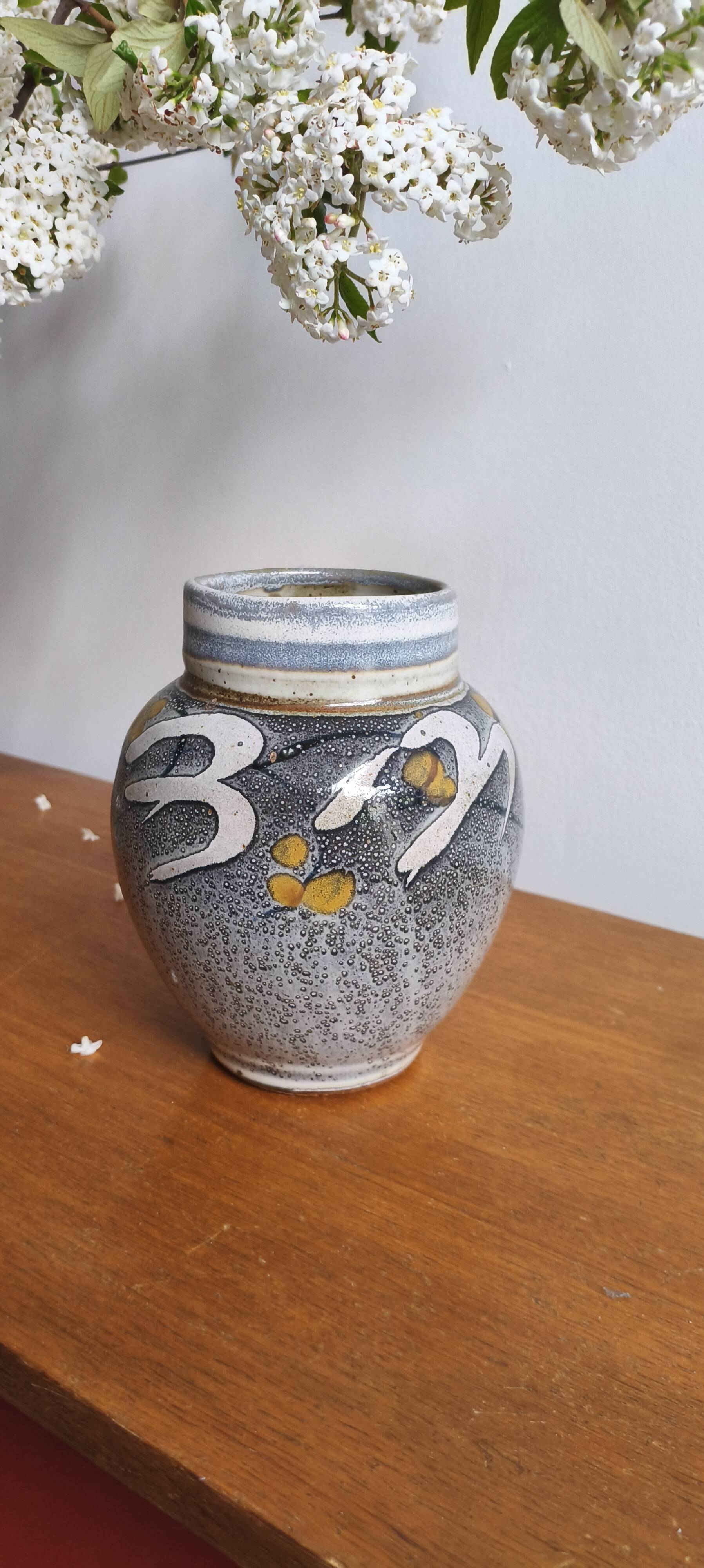 Glazed ceramic vase signed