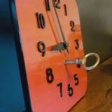 Vintage wall clock from the 50s in red formca